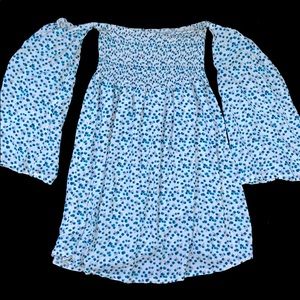 White dress with blue flowers